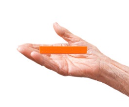 Elderly hand holding Braille Stick